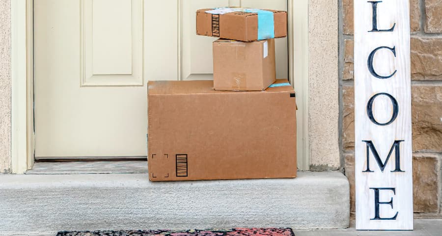 Deliveries on the front porch of a house with a welcome sign in Kingsport